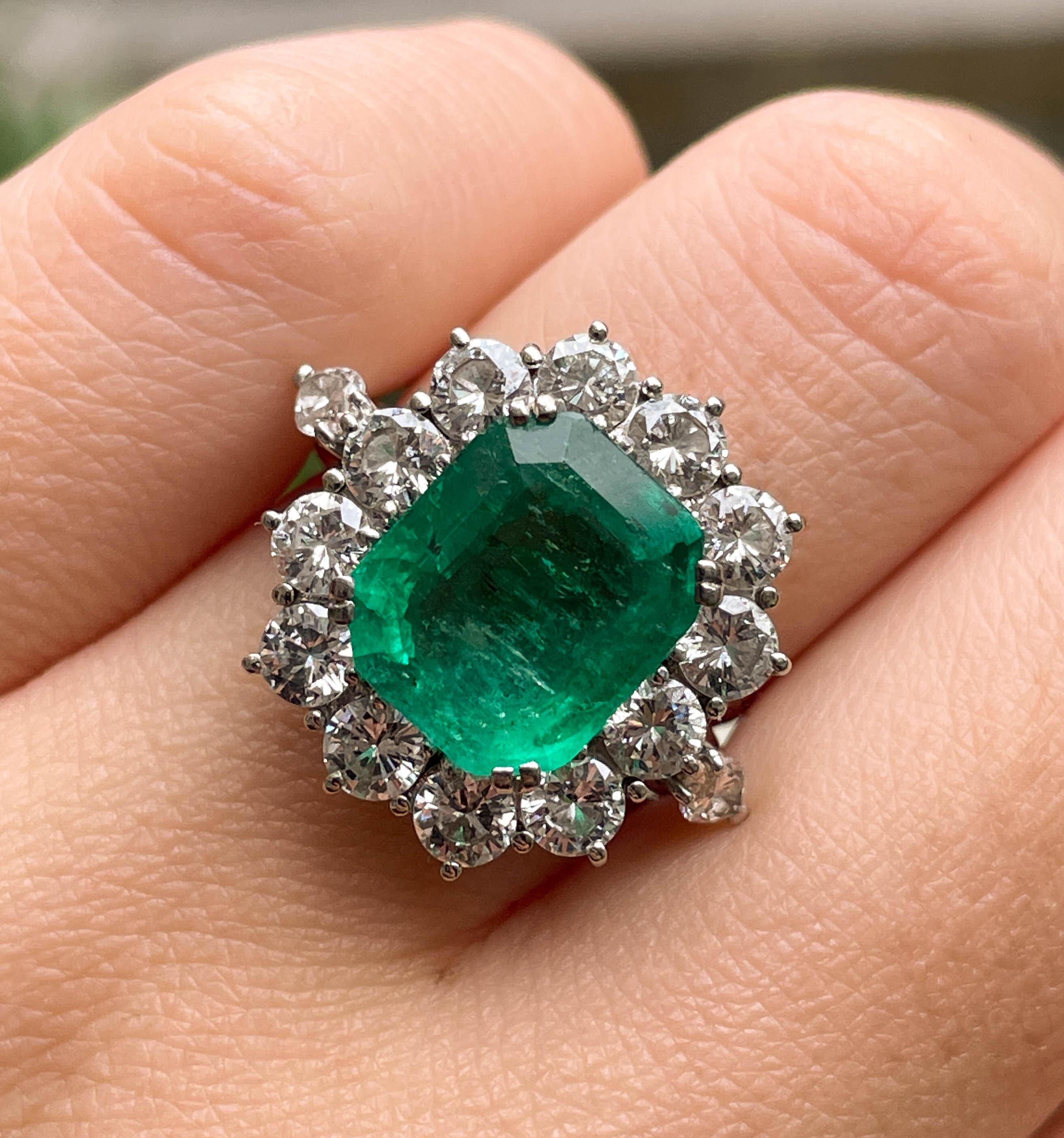 Gorgeous Timeless Vintage ITALIAN-MADE 18k White Gold (stamped) Green Emerald and Diamond Engagement Cluster Ring. The Center Stone is GIA Certified 3.65ct Natural COLOMBIAN Octagonal Step cut Green Emerald. Mesmerizing Transparent Green! The