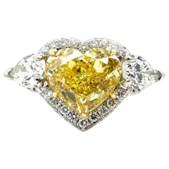 GIA 6.16ctw Natural Fancy Yellow Heart Pear Shaped Diamond 3-Stone Platinum Ring