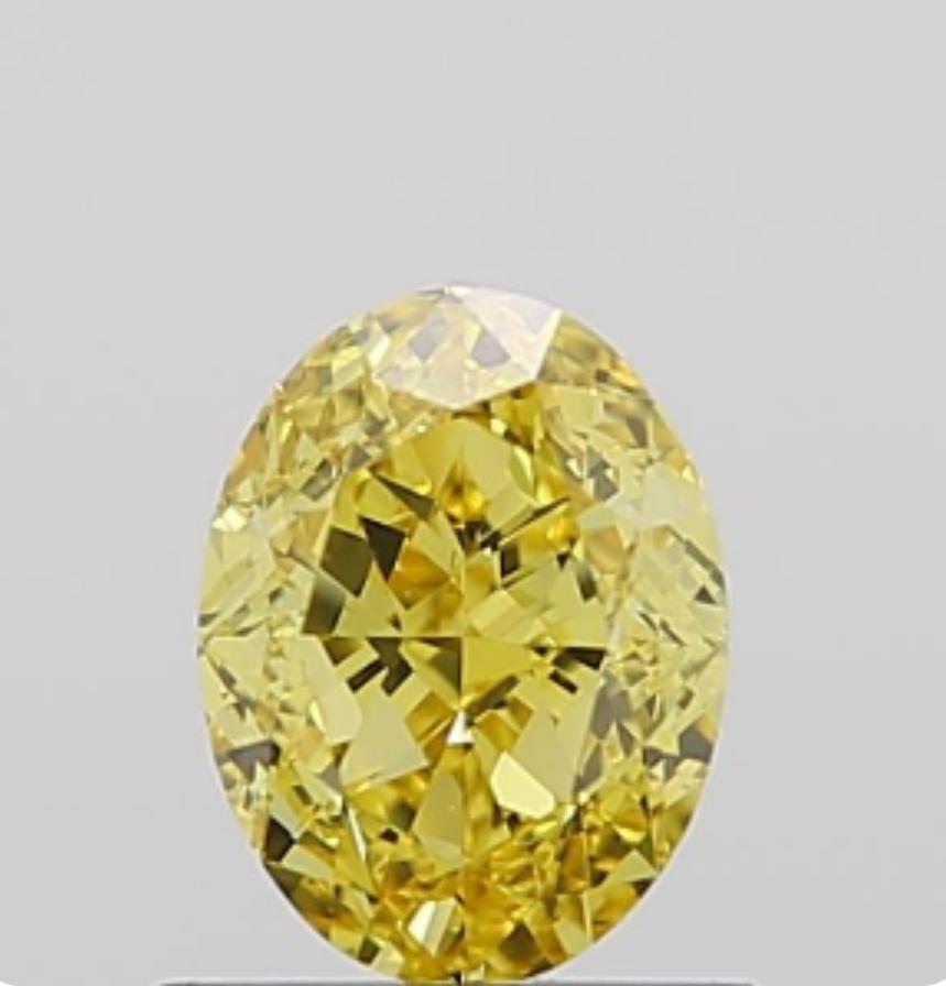 GIA 6.22 Carat Oval Yellow Intense Diamonds 18 Karat Shank Platinum 950 Ring 2