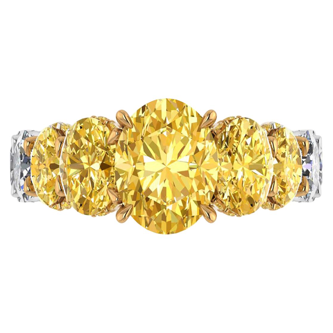GIA 6.22 Carat Oval Yellow Intense Diamonds 18 Karat Shank Platinum 950 Ring
