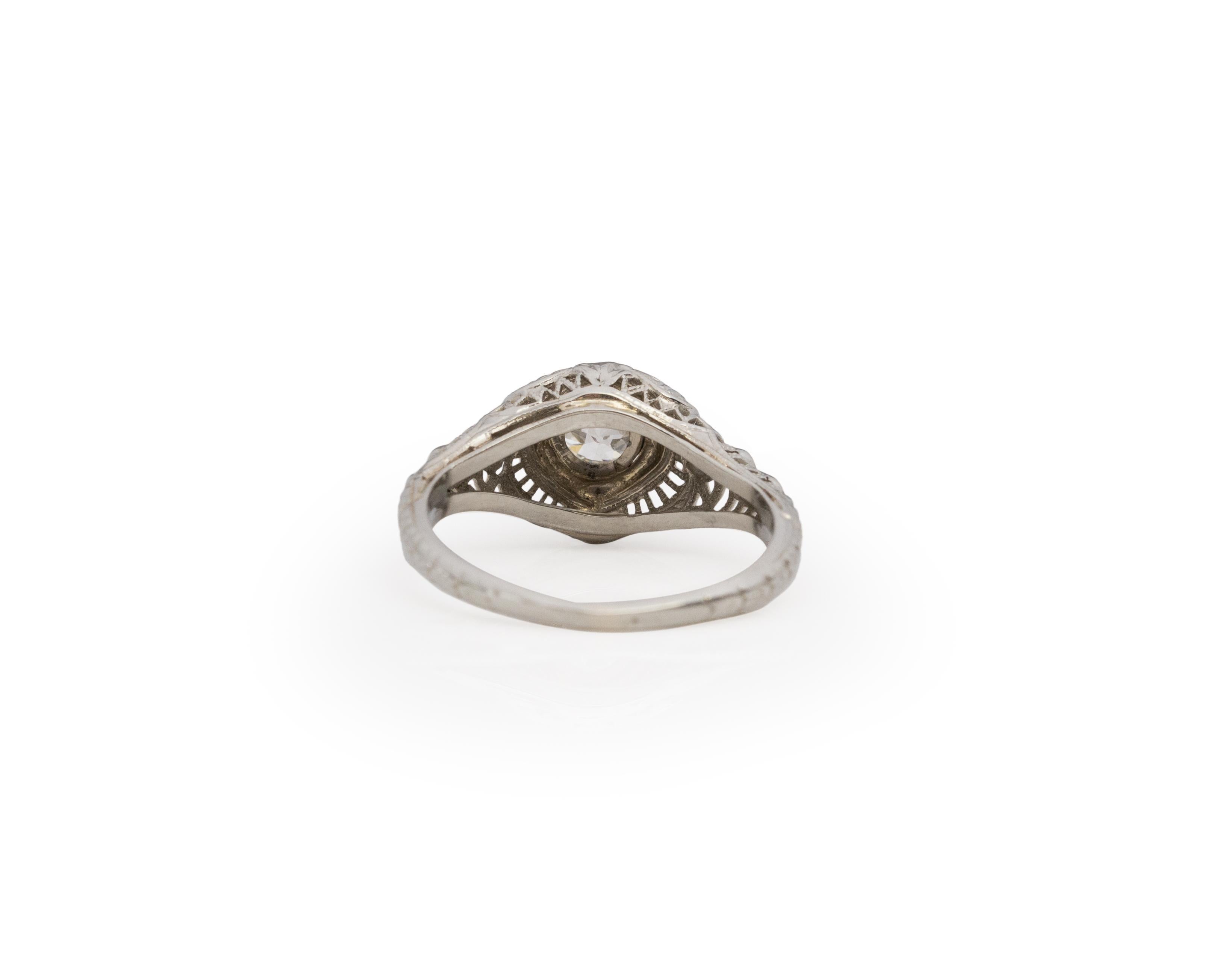 GIA .62 Carat Art Deco Diamond 18 Karat White Gold Engagement Ring In Good Condition For Sale In Atlanta, GA