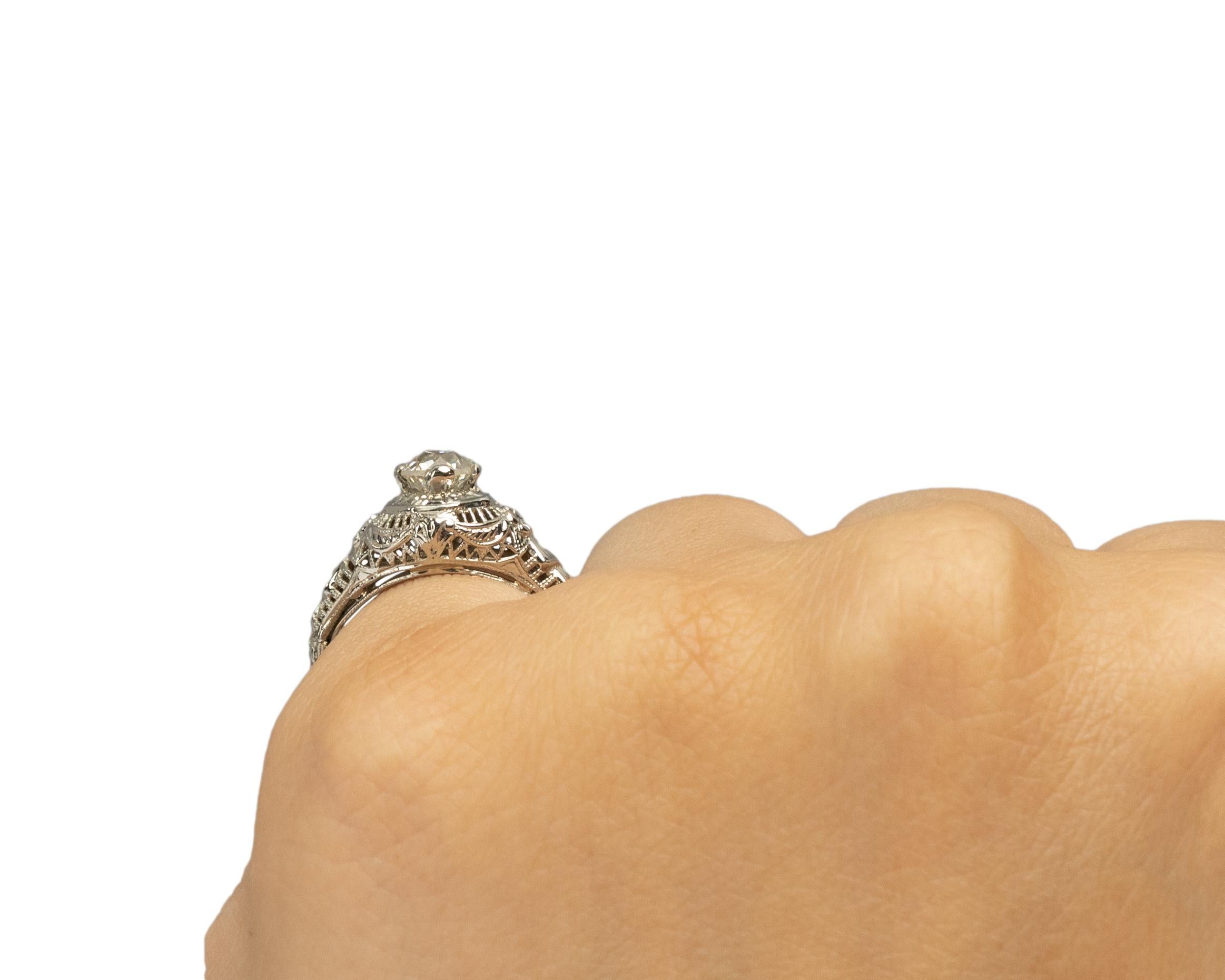 GIA .62 Carat Art Deco Diamond 18 Karat White Gold Engagement Ring For Sale 1