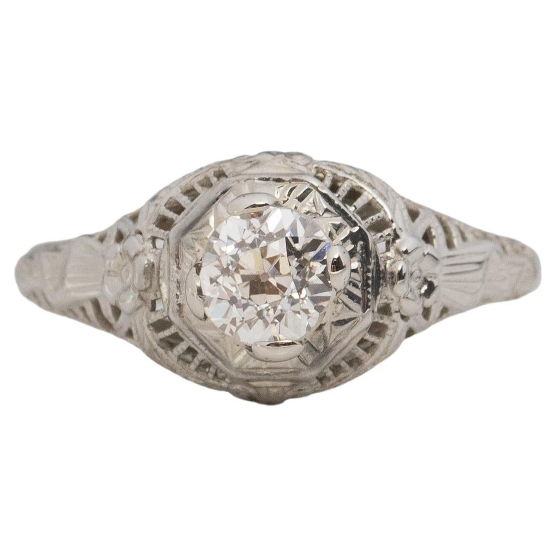 GIA .62 Carat Art Deco Diamond 18 Karat White Gold Engagement Ring For Sale
