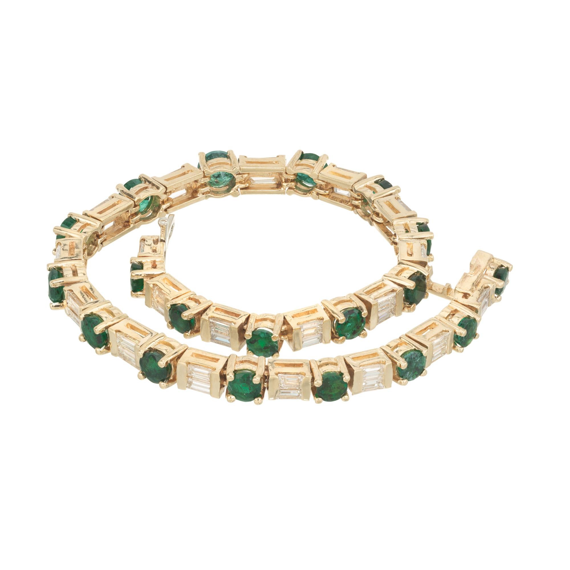 Rich green Brazilian emerald baguette diamond tennis gold bracelet. This bracelet features a stunning 4.40cts of round green Brazilian emeralds as the central gemstone, alternating with 38 baguette cut diamonds. Made from 14k yellow gold, the warm
