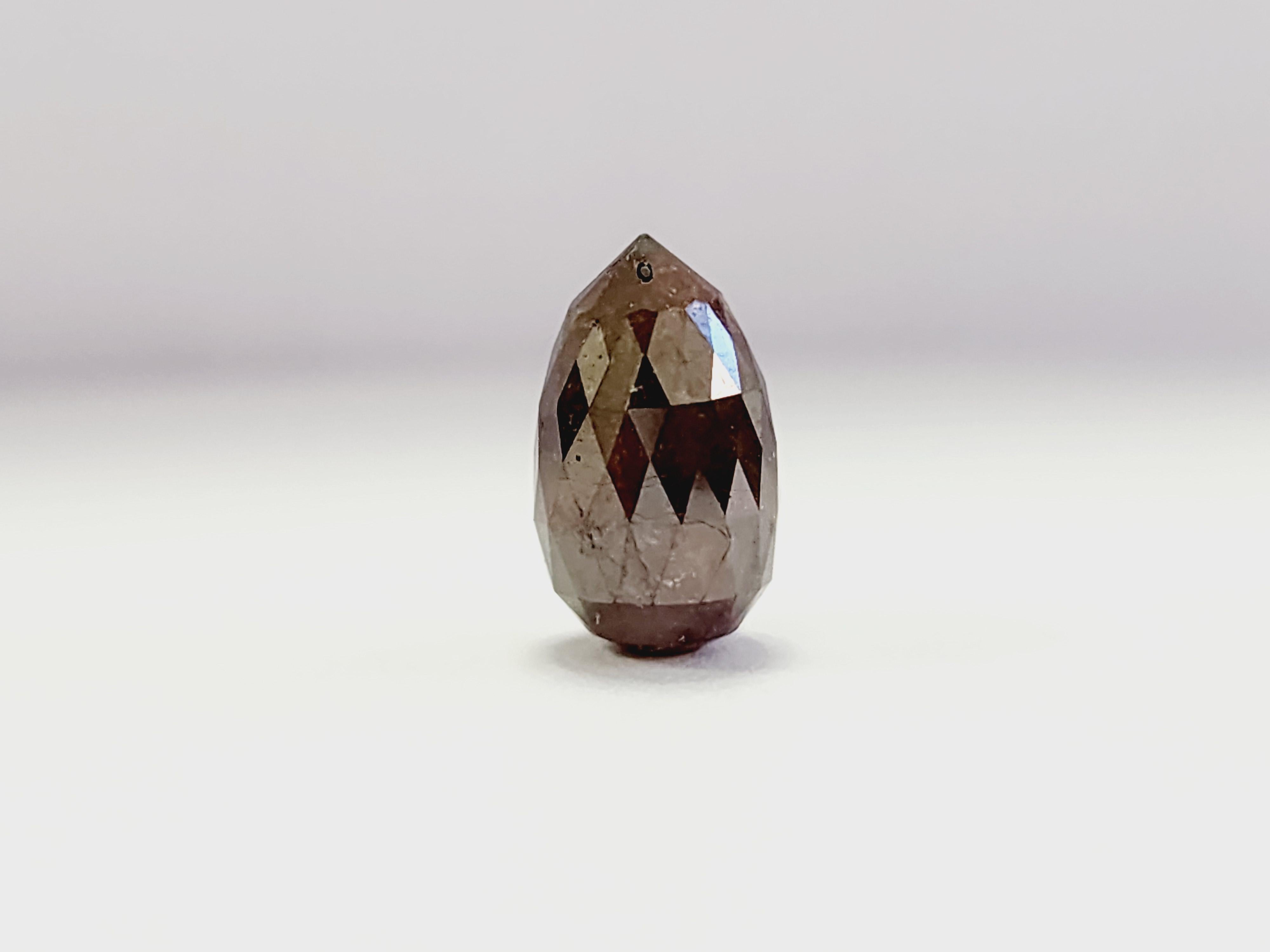 GIA 6.49 Carats Orangy Brown Diamond Briolette 
Featuring a cognac-colored briolette weighing 6.49 carats.

*Free shipping within the US