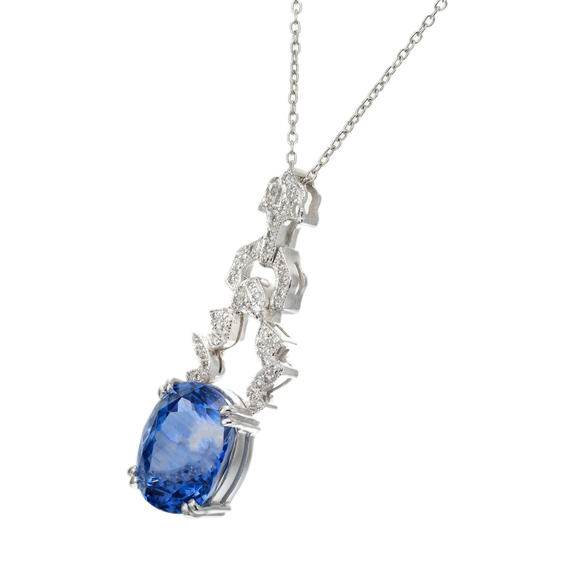 Original Art Deco 1920's sapphire and diamond pendant necklace. This classic Art Deco platinum design encompasses a GIA certified 6.65ct oval sapphire that is accented with 39 round full cut diamonds. Light to medium periwinkle blue natural corundum