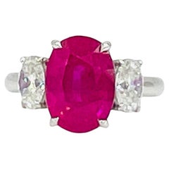 GIA 7 Carat Burma Pink Oval Sapphire and White Oval Diamond Ring in Platinum