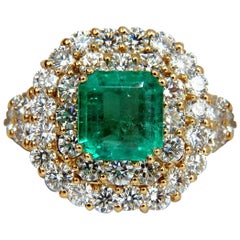 Bague 18 carats, diamants et émeraude de Colombie verte brillante certifiée GIA 7,51