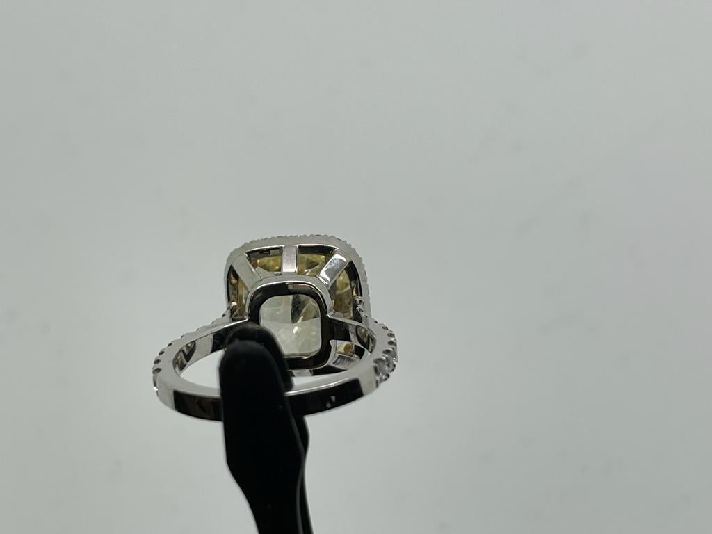 GIA 7.56 Carat Fancy Yellow Cushion Diamond Ring in White Gold In New Condition For Sale In Ramat Gan, IL