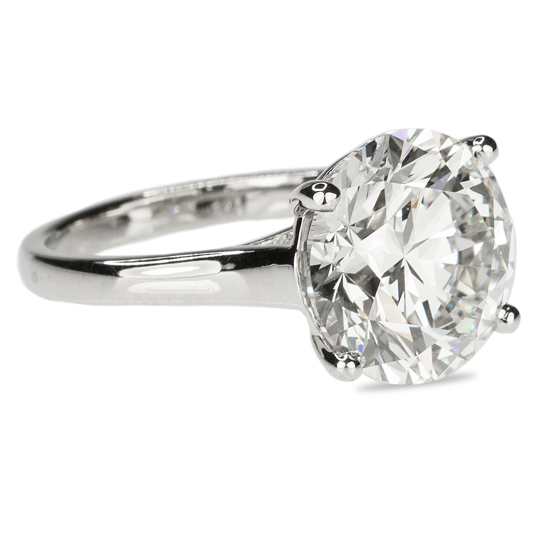 18k Ring with GIA 7.70 carat I color VS2 clarity Round Brilliant diamond.