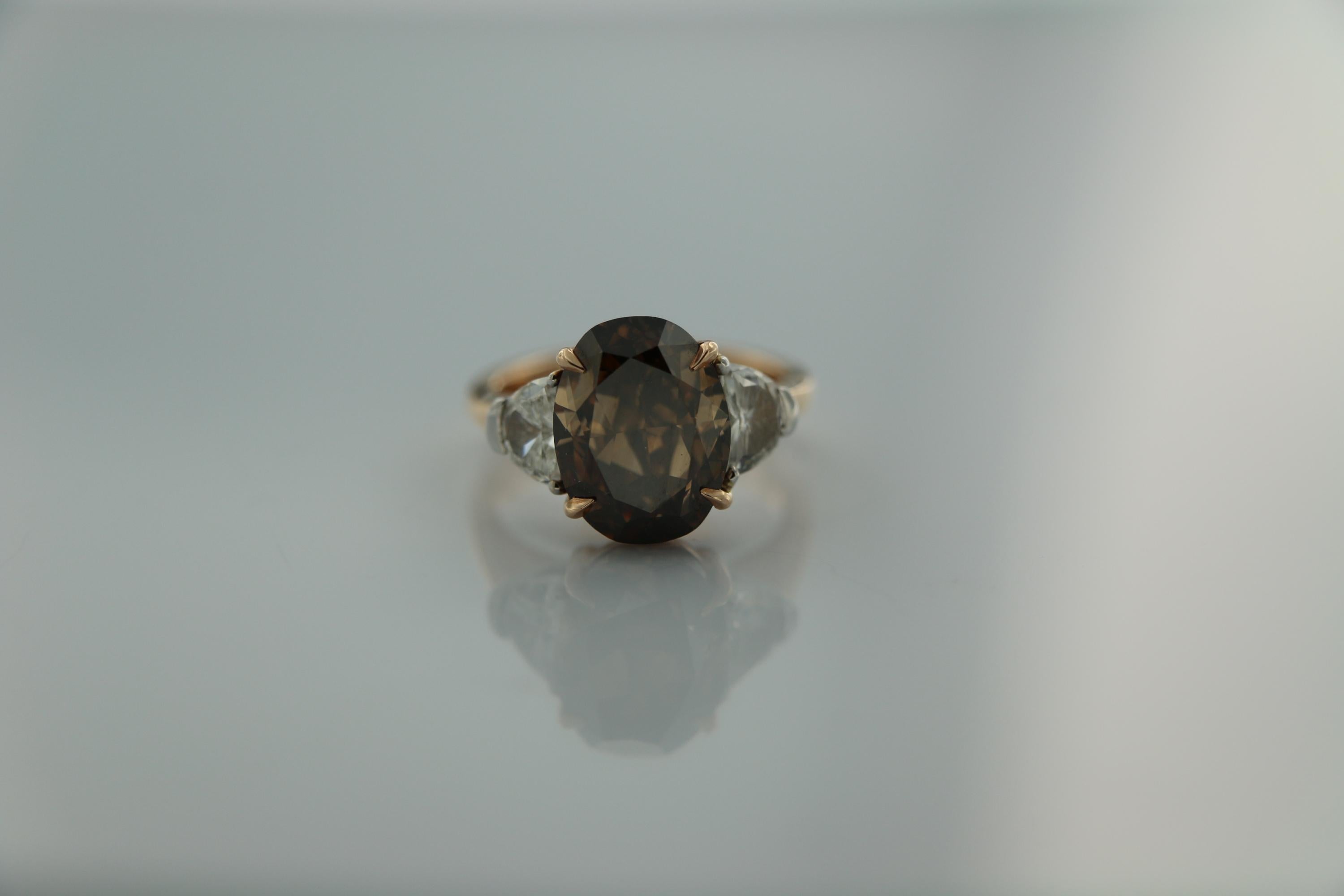 GIA 7.97 Carat Natural Fancy Dark Orange Brown Oval brilliant Diamond Ring. For Sale 1