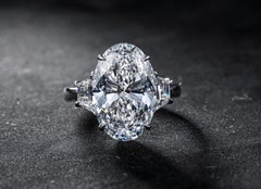 GIA 8 Carat D VS2 Oval Diamond Platinum Ring with Step-Cut Trapezoids