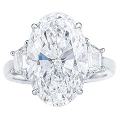 GIA 8 Carat D VS2 Oval Diamond Platinum Ring with Step-Cut Trapezoids