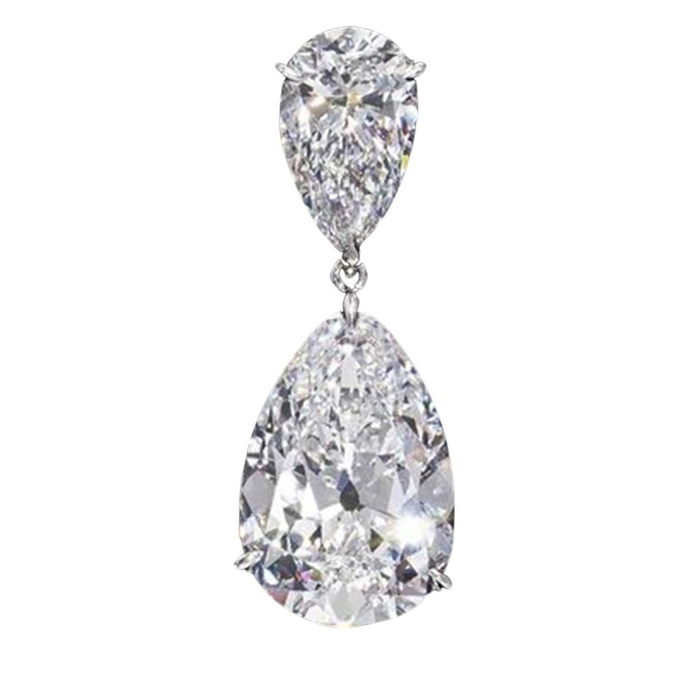 Contemporary GIA 8.03 Carat Matched Pair of Pear Cut Diamonds set in 18K White Gold For Sale
