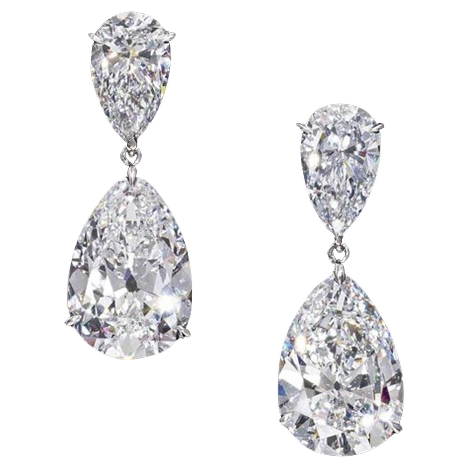 GIA 8.03 Carat Matched Pair of Pear Cut Diamonds set in 18K White Gold For Sale