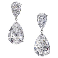 GIA 8.03 Carat Matched Pair of Pear Cut Diamonds set in 18K White Gold
