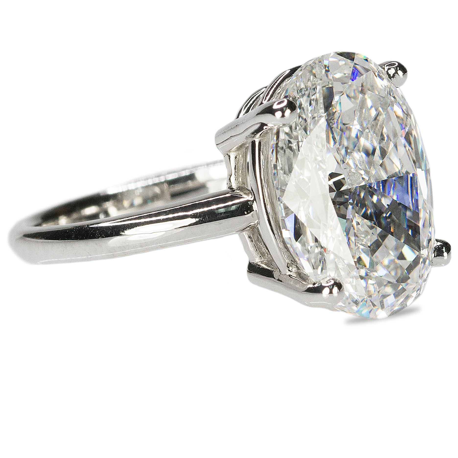 18k Ring with GIA 8.03 carat E color VS2 clarity Oval Brilliant diamond.