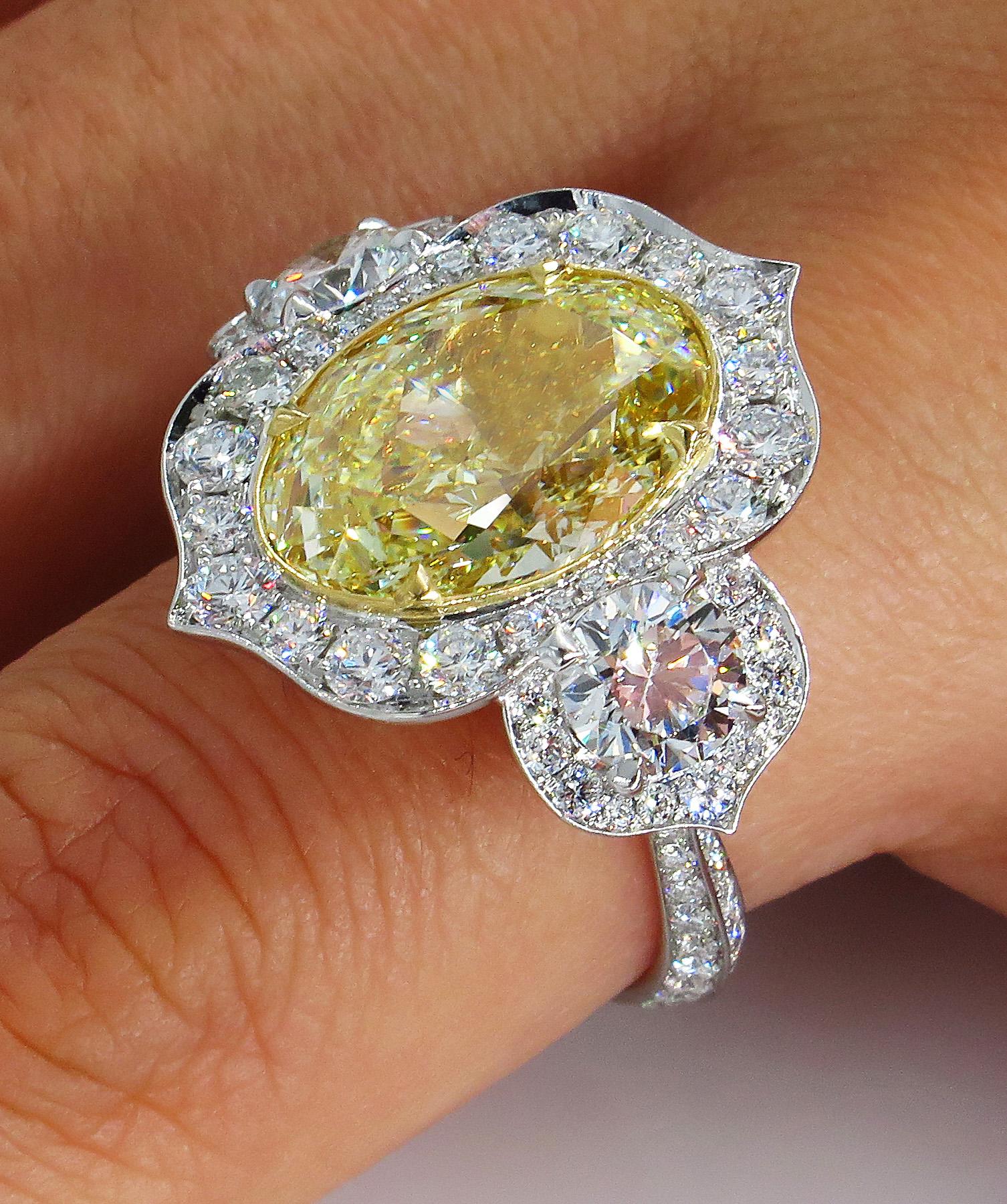 GIA 8.22 Carat Fancy Yellow Oval Diamond 3-Stone Engagement Platinum Ring 5