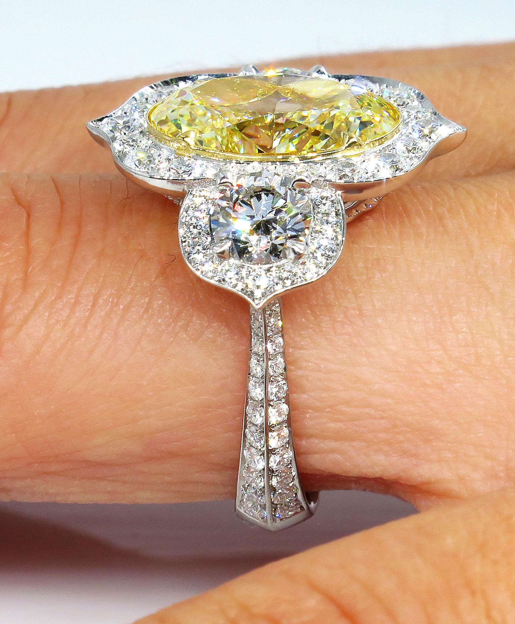 GIA 8.22 Carat Fancy Yellow Oval Diamond 3-Stone Engagement Platinum Ring 7