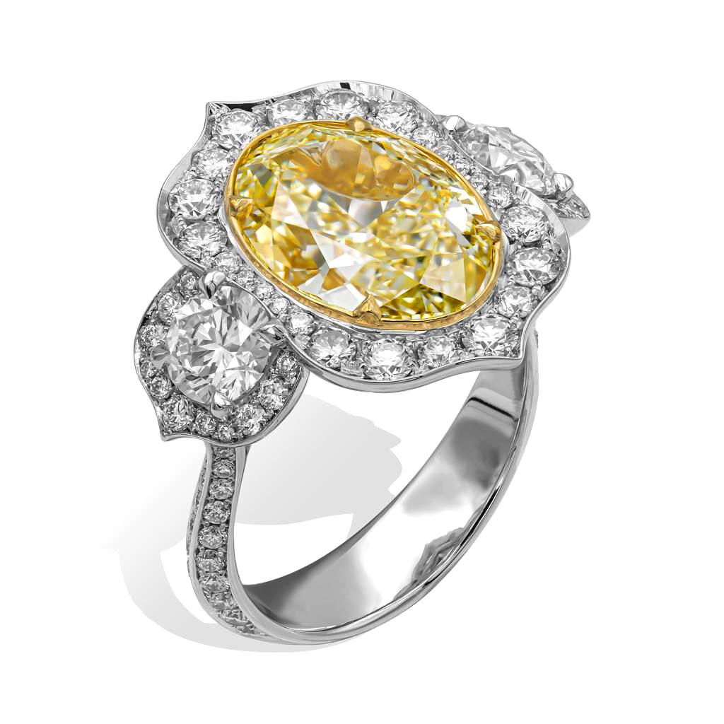 The Ultimate Luxury.  A beams of sunshine radiate day and night from this fabulous dazzler with gorgeous center natural fancy color diamond is ignited by bright white diamonds that shimmer with real sparkle and flair.  A SUPER RARE Find for any