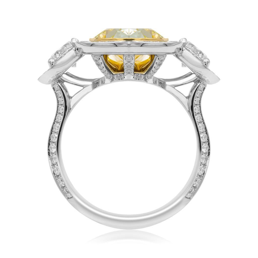 Oval Cut GIA 8.22 Carat Fancy Yellow Oval Diamond 3-Stone Engagement Platinum Ring