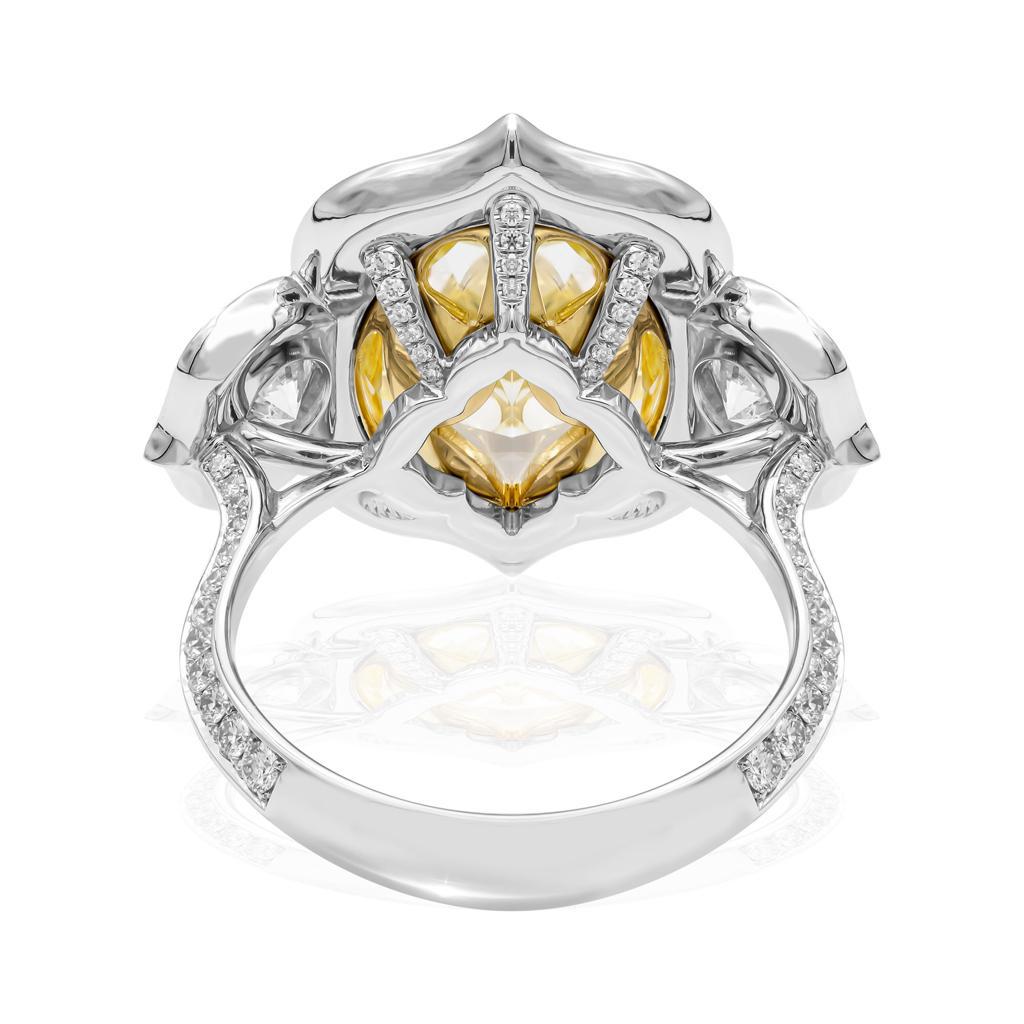 GIA 8.22 Carat Fancy Yellow Oval Diamond 3-Stone Engagement Platinum Ring In Good Condition In New York, NY