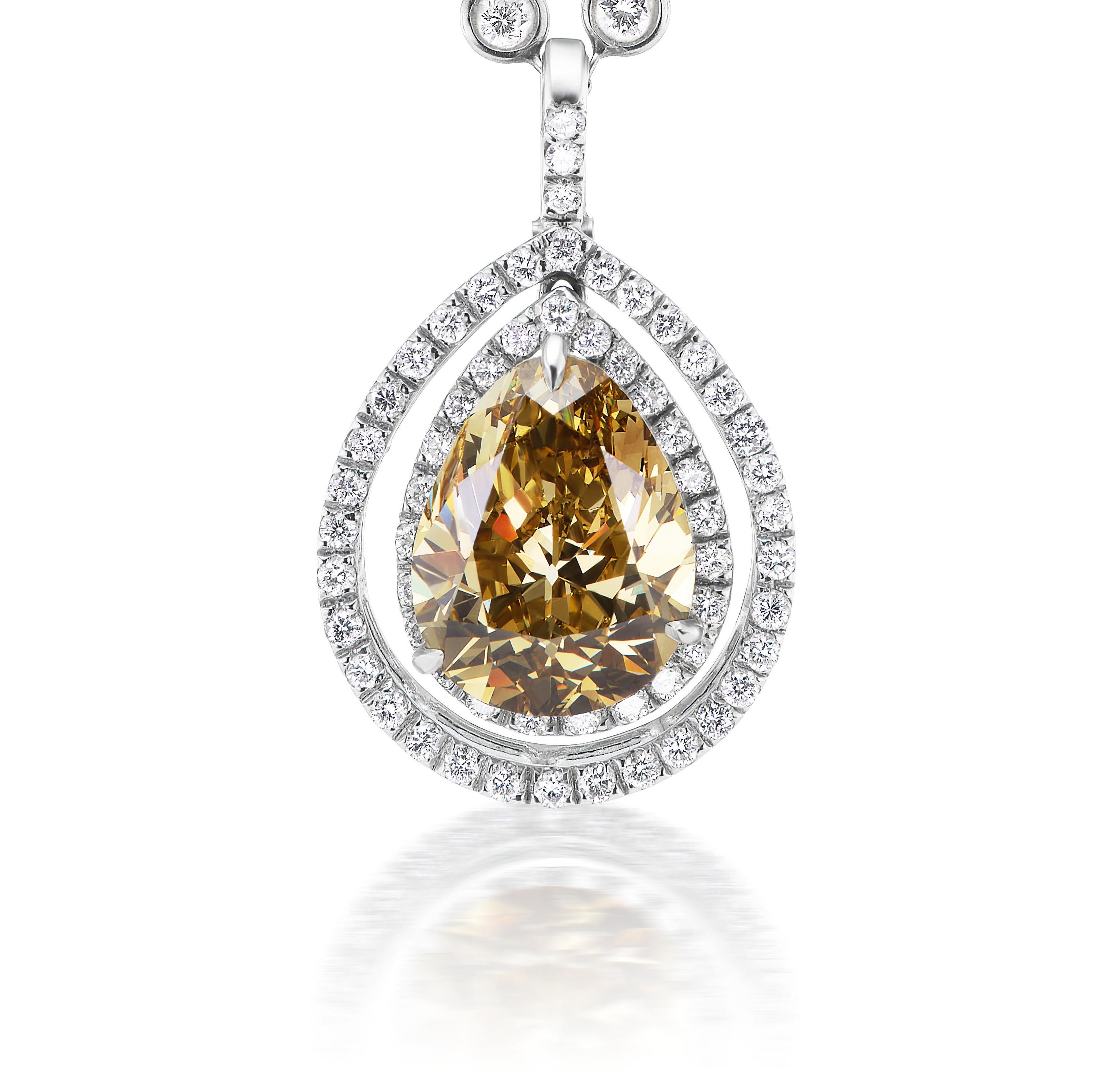 Rare and unique fancy deep brownish greenish yellow pear-shape diamond weighing 8.30 carats and VS1 clarity.

Set in double halo pendant hanging from 16 inch diamonds by the inch chain.

Comes with GIA certificate