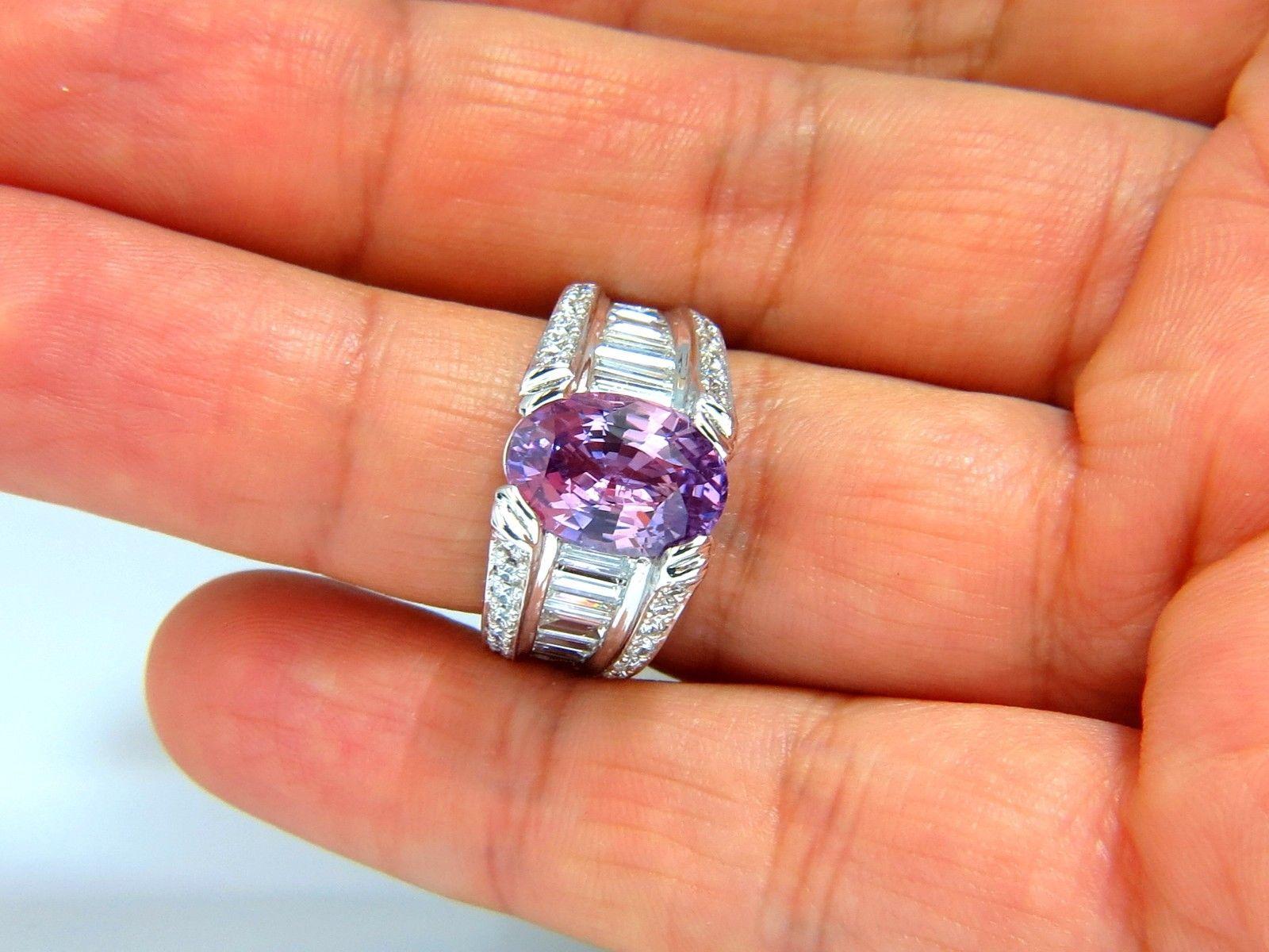 A+ Tangibility.

GIA Certified 

5.50ct. Natural No heat Sapphire ring.

Report: 2155939886

Oval cut: 12.18 X 8.67  X 6.05mm

Transparent, purplish pink & Clean Clarity.



3.00ct. Side baguettes & rounds: 

F/G-color, Vs-2 clarity.

14kt. white