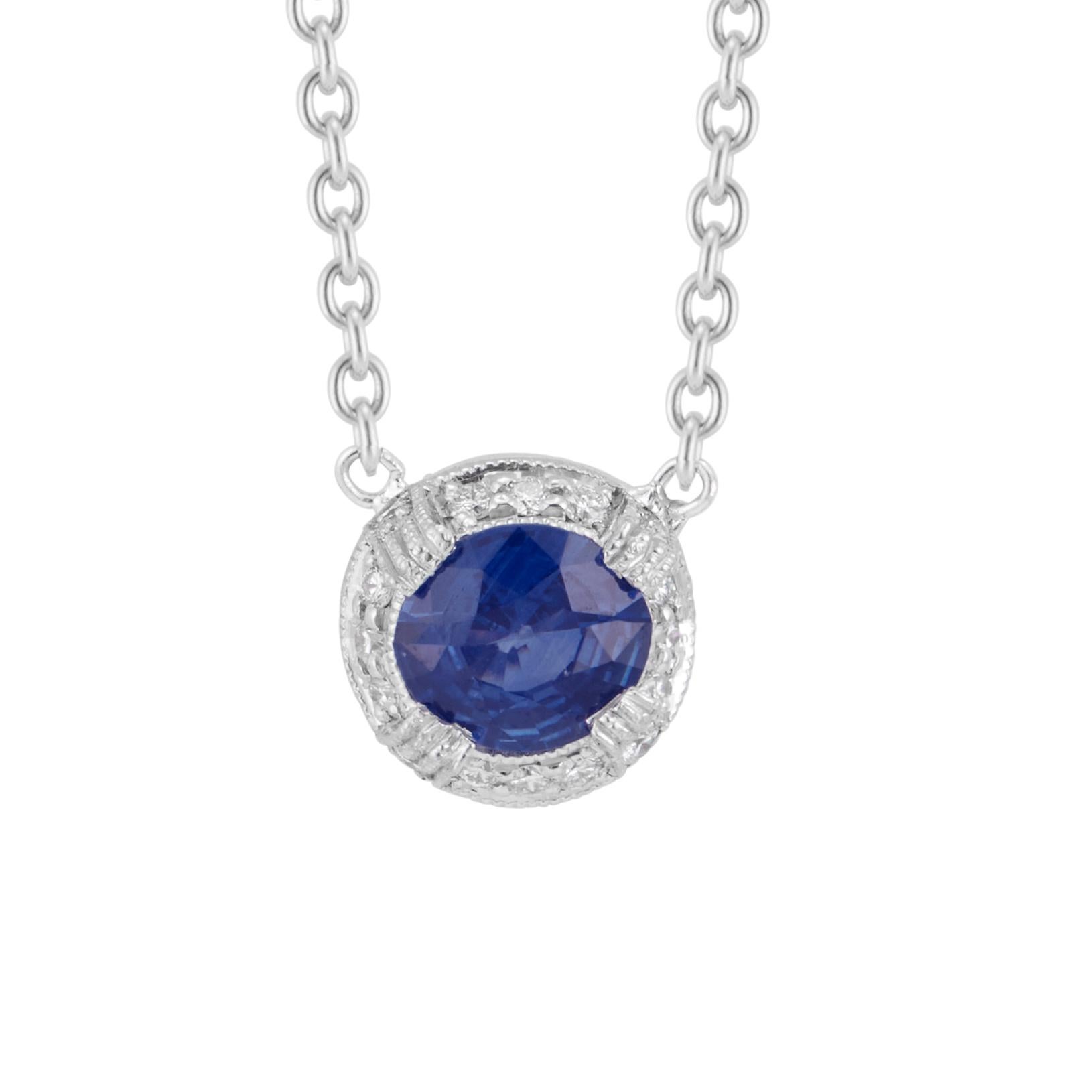 Sapphire and diamond necklace. GIA round sapphire and pave diamond halo pendant necklace. 16 inch platinum cable chain. Sapphire is certified simple heat only.

1 round gem blue fine Sapphire, approx. total weight .88cts, VS, 6.15 x 6.10ct, 39mm,