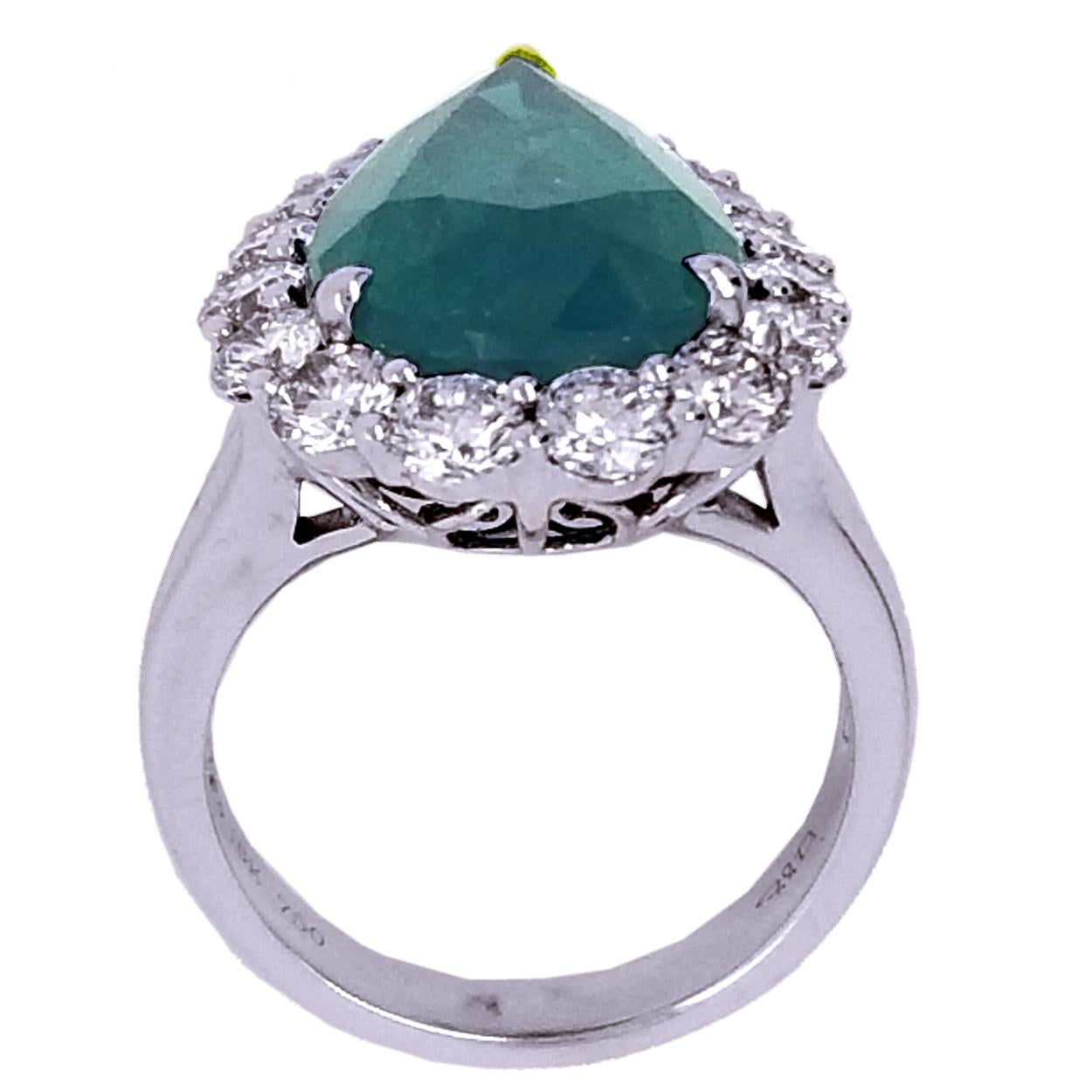 Contemporary GIA 8.90 Carat Pear Shape Emerald Split Shank Engagement Ring with Halo For Sale