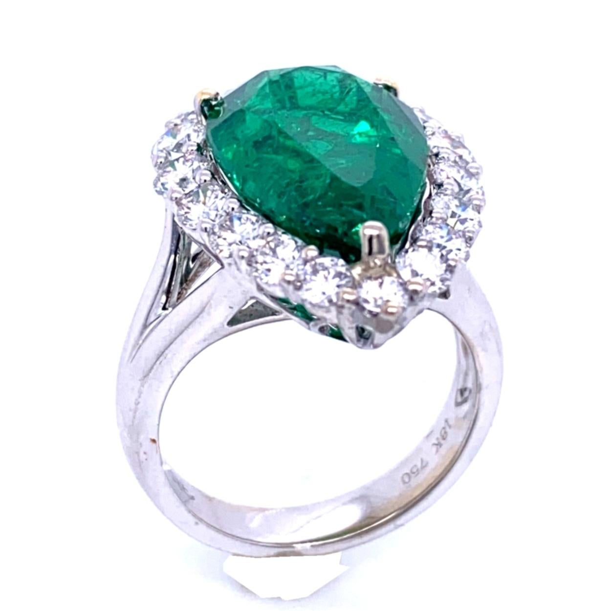 Pear Cut GIA 8.90 Carat Pear Shape Emerald Split Shank Engagement Ring with Halo For Sale