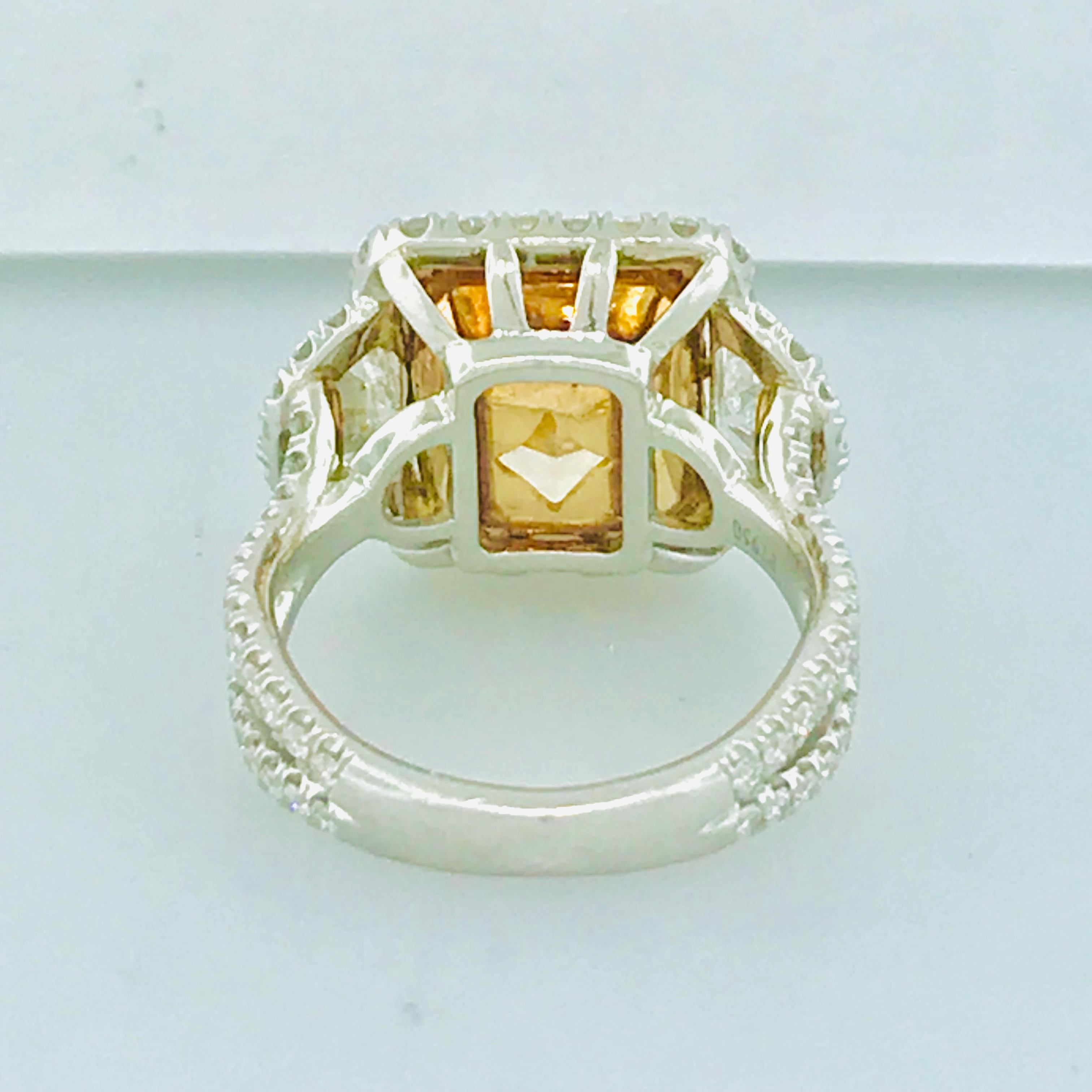 Artisan GIA 9 Carat Diamond Total Weight Fancy Yellow Diamond 3-Stone Platinum Ring