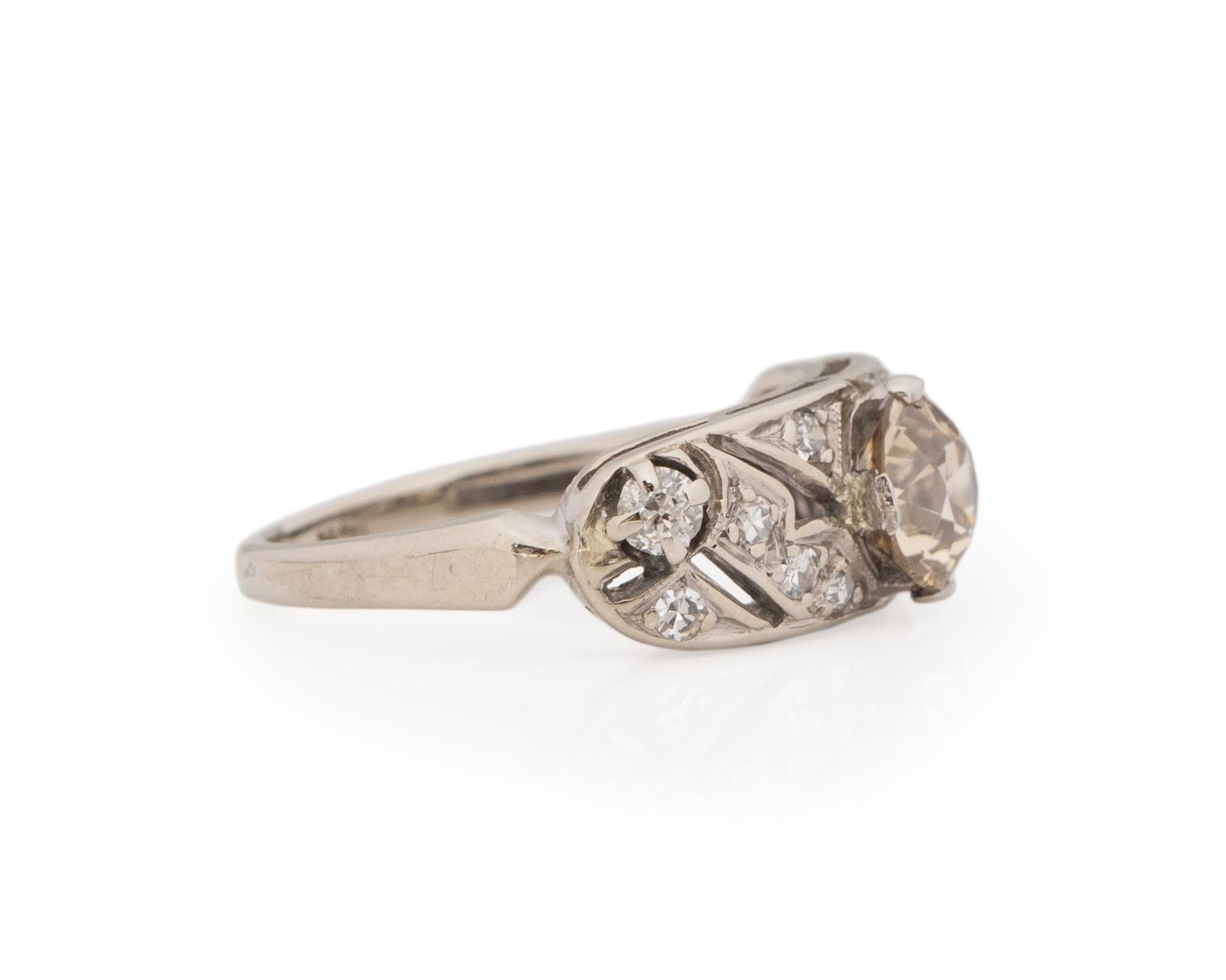 Ring Size: 5.25
Metal Type: Platinum [Hallmarked, and Tested]
Weight: 2.7 grams

Diamond Details:
GIA REPORT #:6224425940
Weight: .91ct, total weight
Cut: Old European brilliant
Color: Light Brown (Cinnamon Color)
Clarity: VS2
Measurements: 6.19mm x