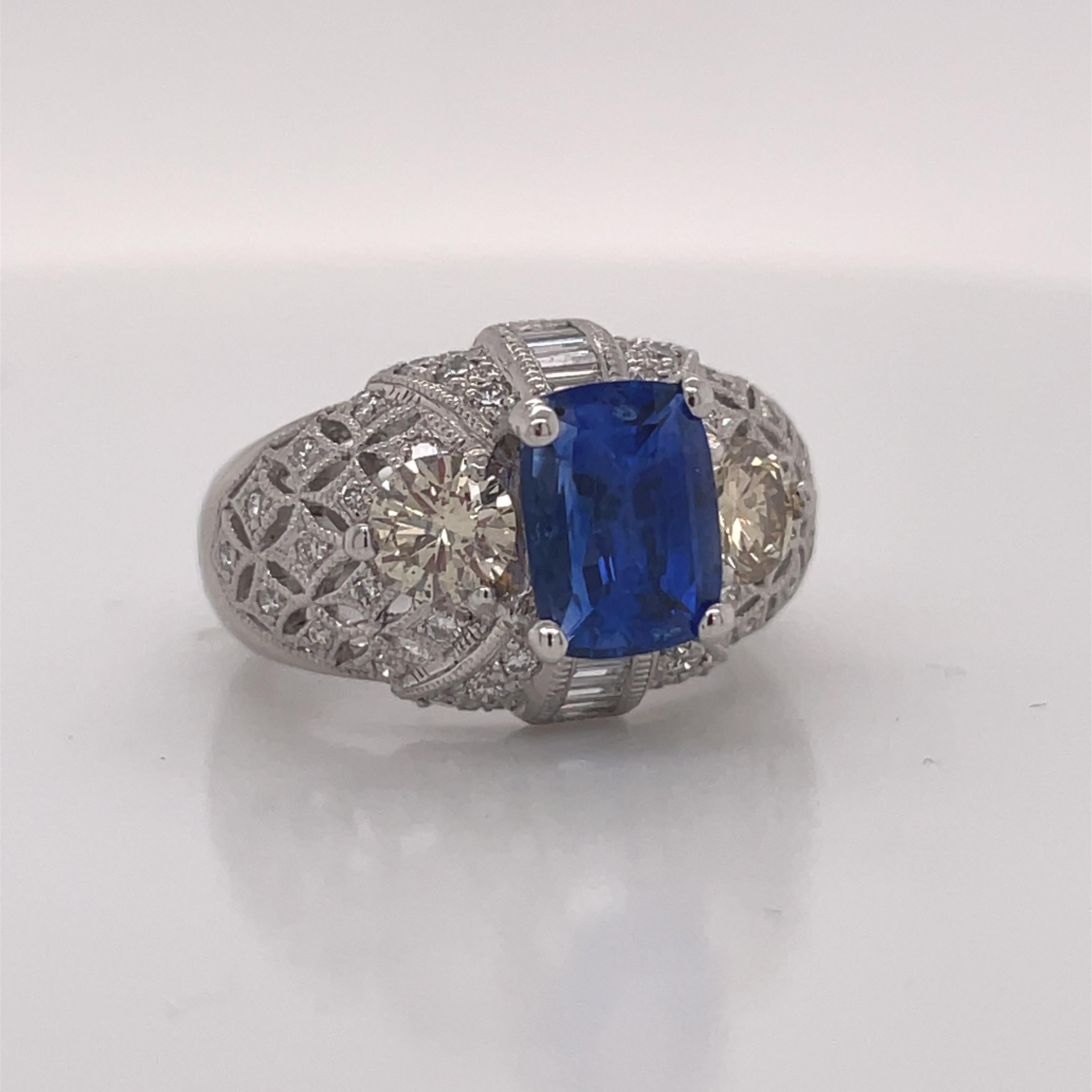 This is a Platinum Fancy Diamond and Certified GIA and AGL Blue Sapphire Ring 

 Can you imagine what this ring would look like adorning your finger? Your friends gather around, eyes wide and gleaming, the sparkle in their eyes not only from their