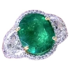 Anillo de oro de 18 quilates con esmeralda zambiana natural certificada AIG de 6,70 y diamantes de 1,40 quilates