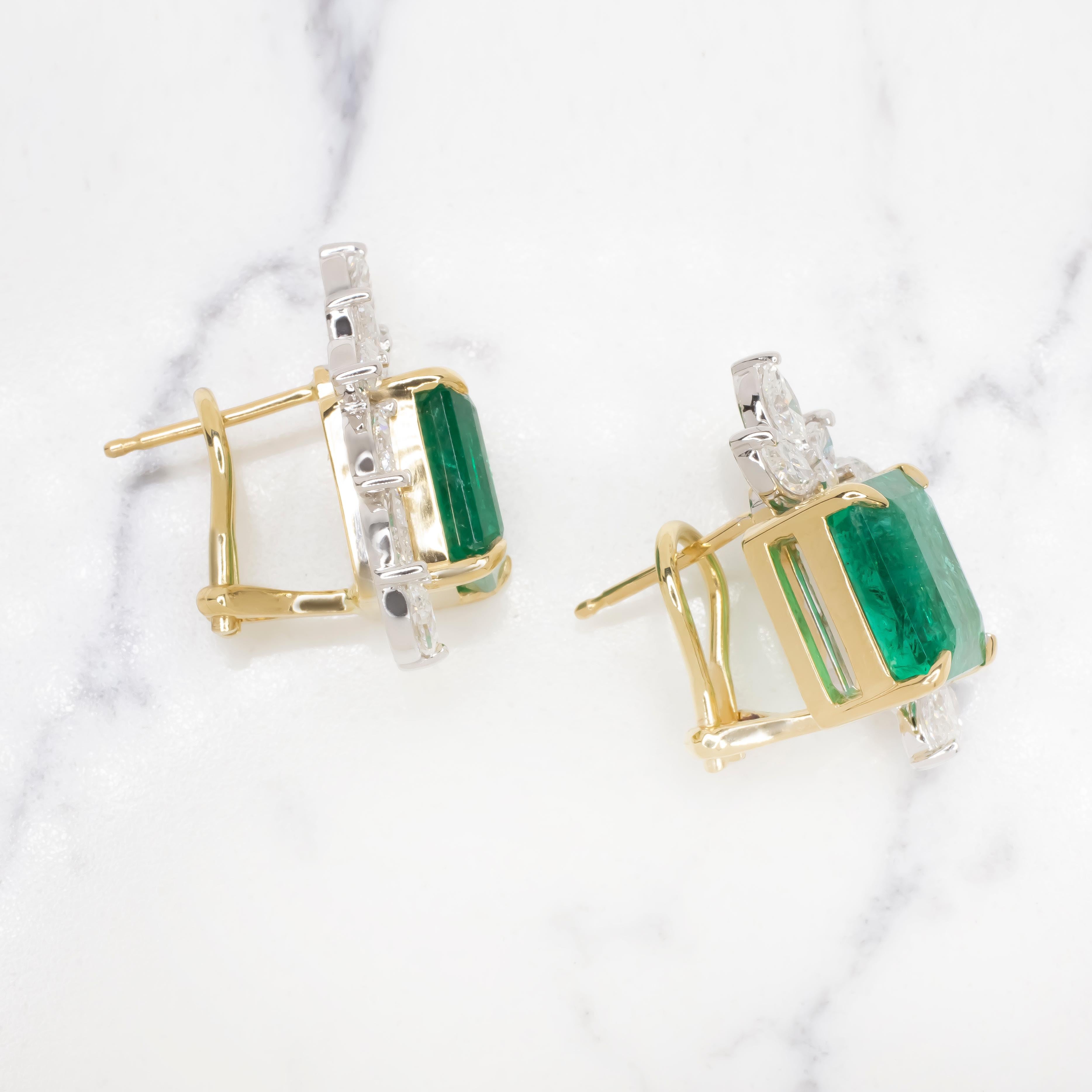 An exquisite pair of vivid green natural octagonal step cut emerald and marquise diamonds earrings
Each earring is set with an octagonal step-cut emerald, decorated with marquise-shaped diamonds.
The earrings comes with GIA and IGI certificate which