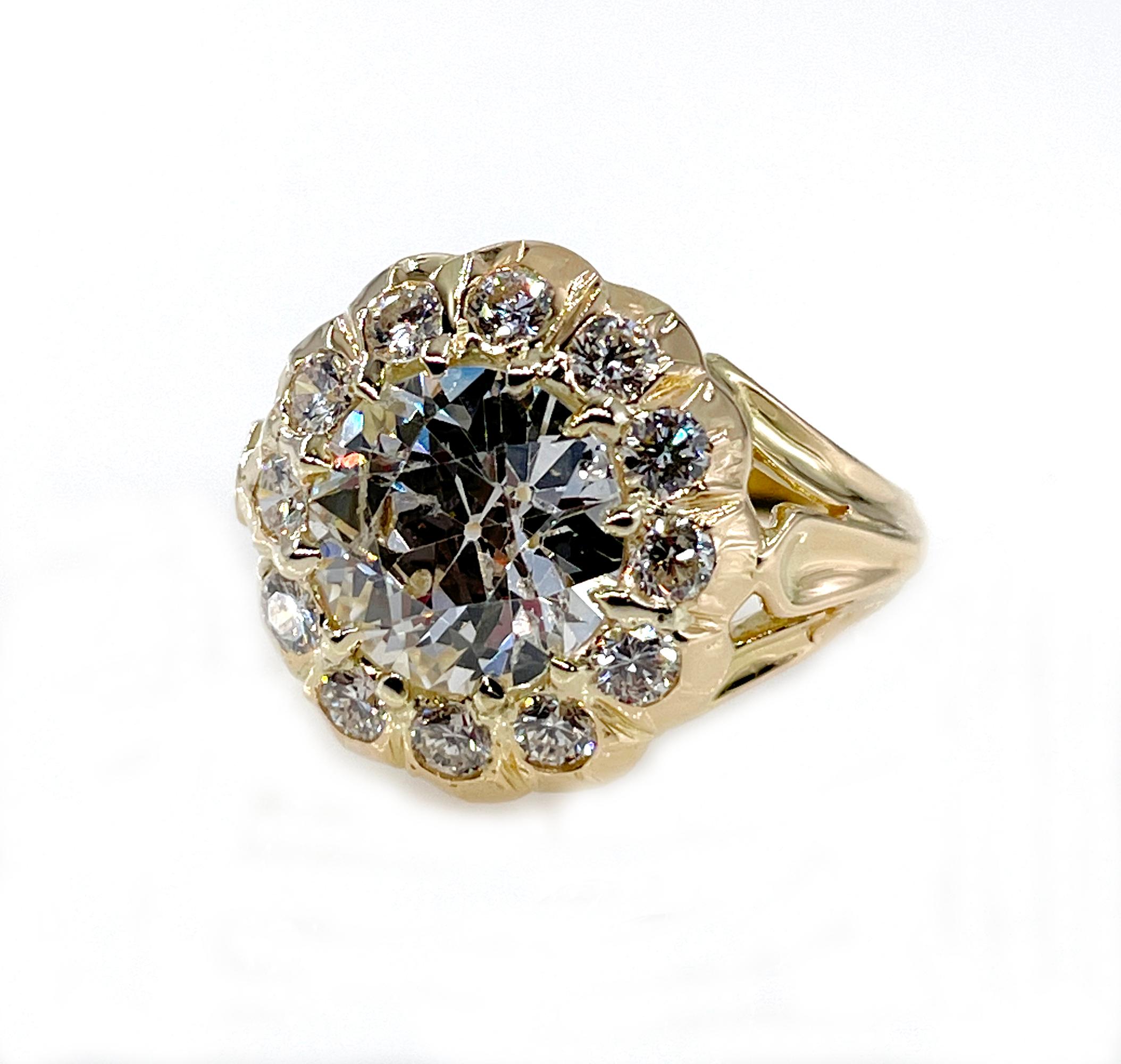 This breathtakingly beautiful CIRCA 1890s Authentic VICTORIAN Cluster Flower shaped 18K yellow Gold Ring (tested) .
The total weight of the diamonds is estimated 3.27ct.

The Center Diamond is an OLD European Cut GIA certified 2.35ct in H color, I1