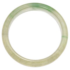 GIA Antique Type B "Ice" Green Semi-Variegated Translucent Jade Bangle GIA Antique Type B "Ice" Green Semi-Variegated Translucent Jade Bangle
