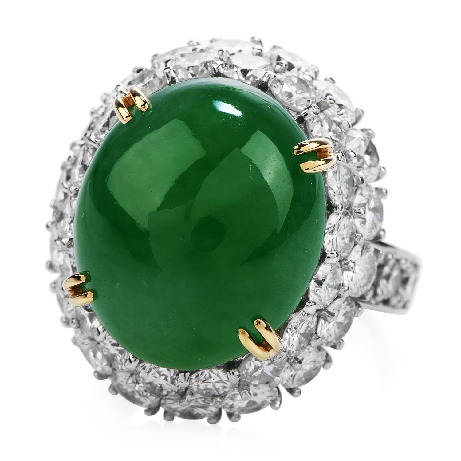 A Very fine quality Magnificent Green Imperial Jade with Luxurious Extra white Diamonds all Around!

This divine Oval Shaped Cocktail Ring is Crafted in Solid Platinum with 18K Yellow Gold Prongs,

weights 19.1 grams and the top measures 20 mm x 23