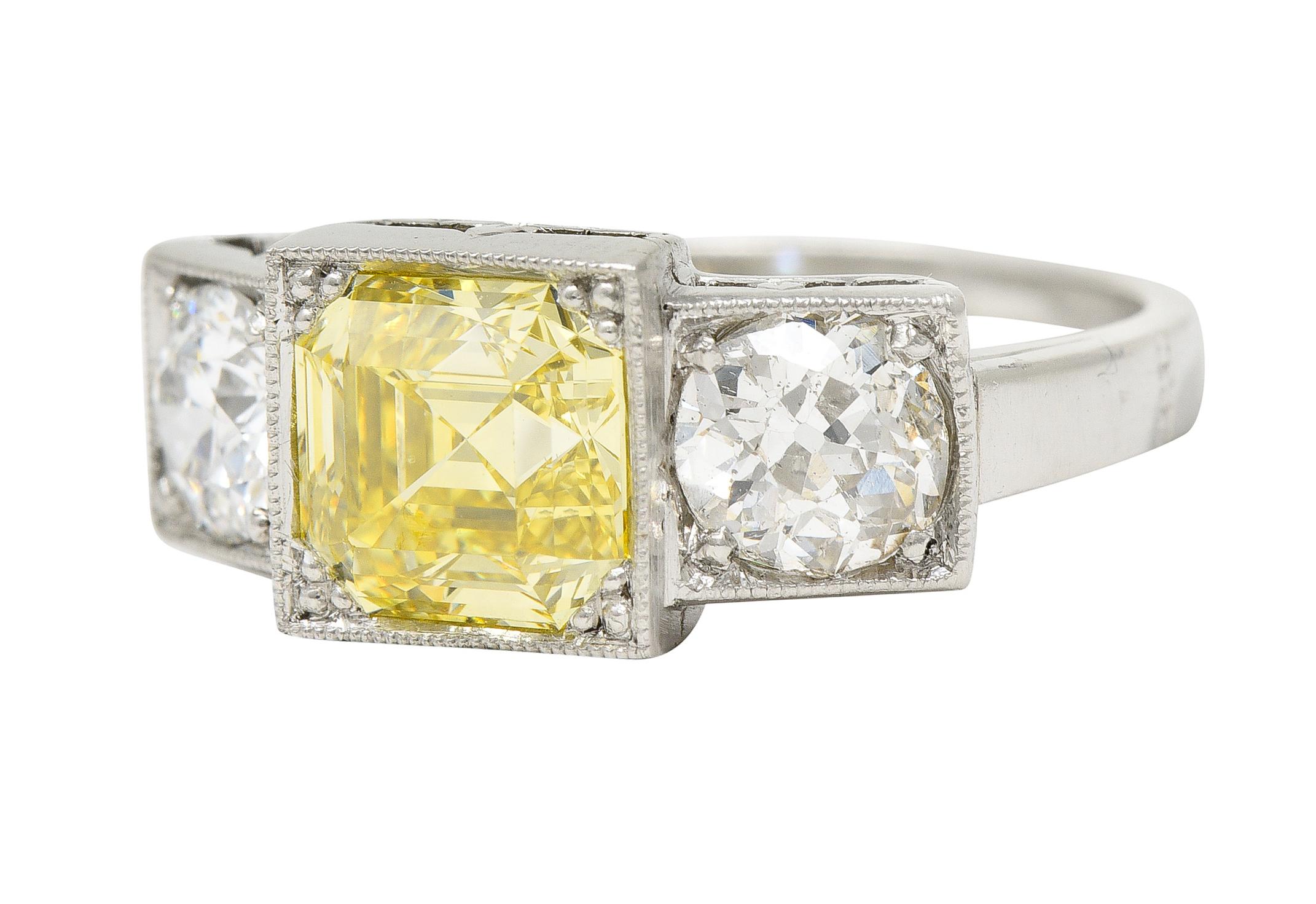 GIA Art Deco 3.20 Carats Asscher Cut Fancy Intense Yellow Diamond Platinum Ring For Sale 2