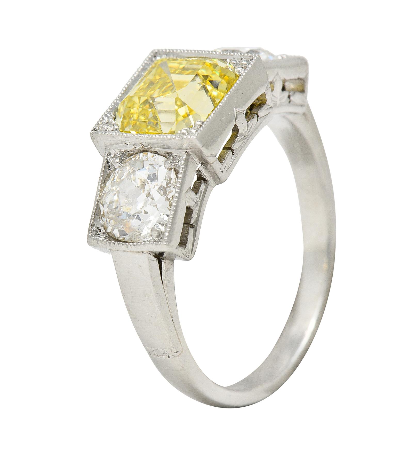 GIA Art Deco 3.20 Carats Asscher Cut Fancy Intense Yellow Diamond Platinum Ring For Sale 4