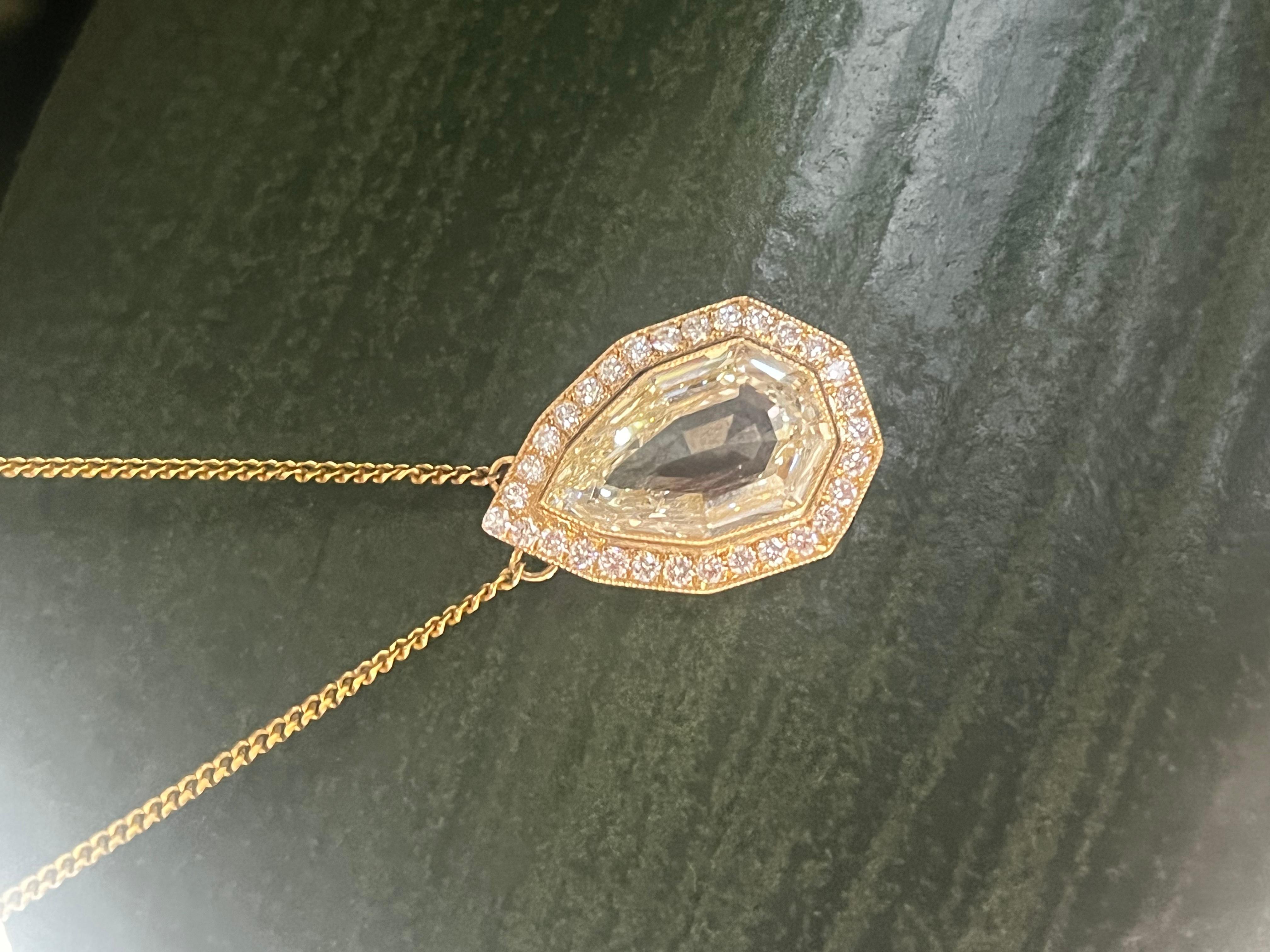 GIA Art Deco Style Fancy Yellow Pear Shaped Step Cut Diamond Pendant For Sale 1