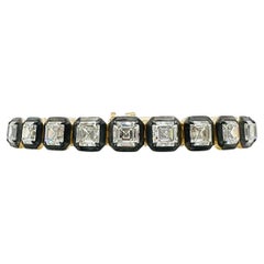 Bracciale con diamanti taglio Asscher GIA in oro giallo 18 carati e rodio nero