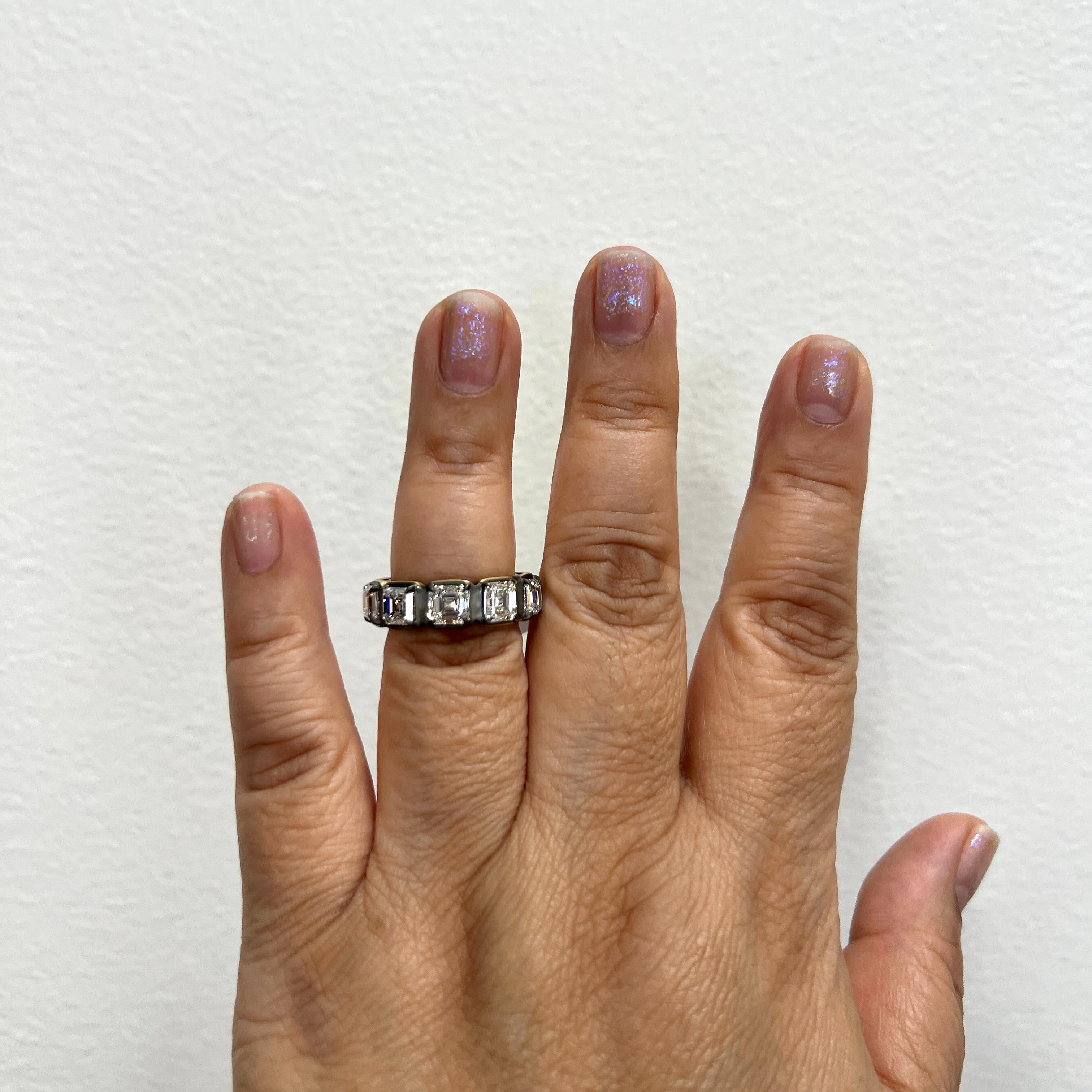 Beautiful 9.07 ct. I-J VVS-SI white diamond asscher cuts.    Total of 10 stones.  Each stone is about 0.90 ct. Handmade in 18k yellow gold and black rhodium.  Ring size 7.  All stones have a GIA certificate.