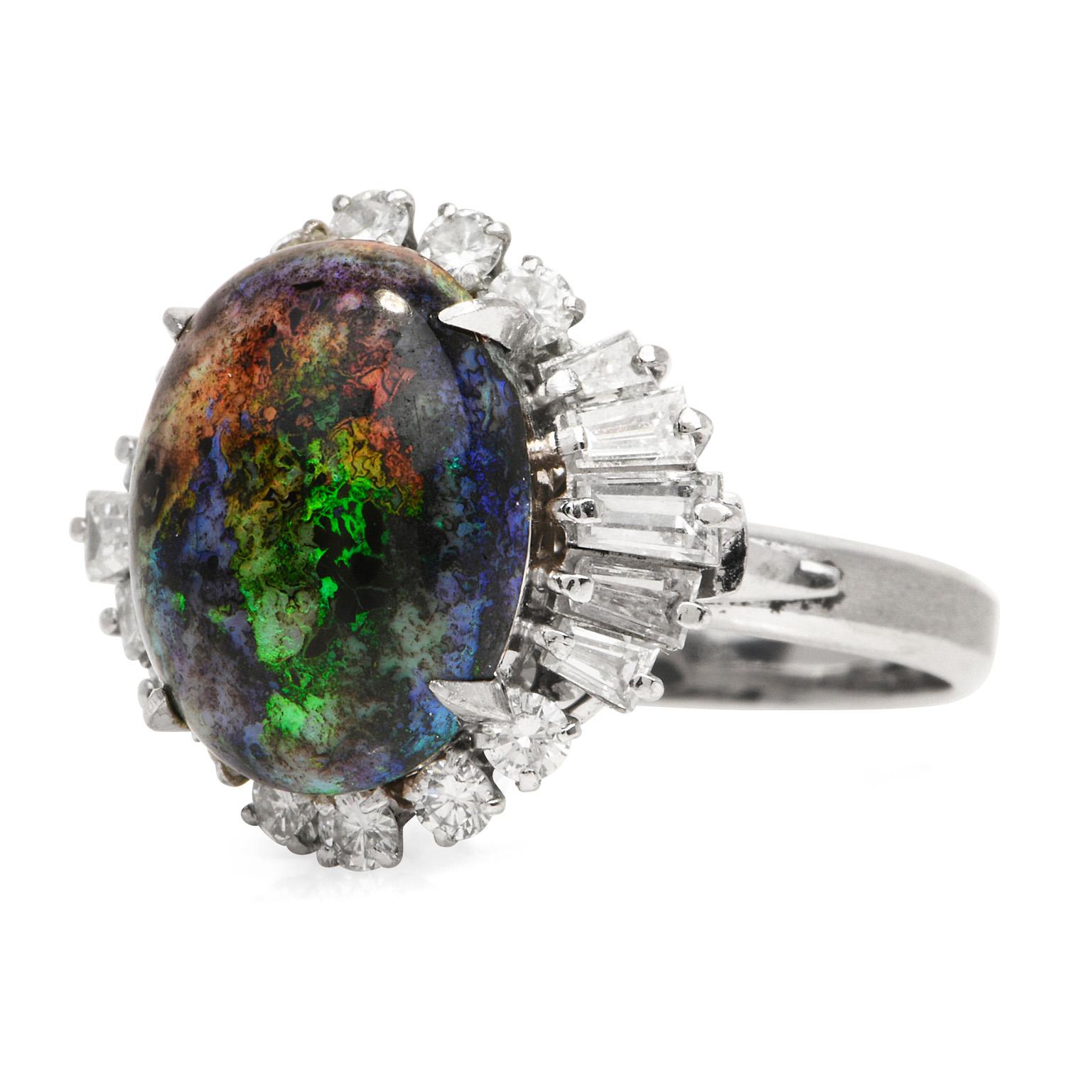 The look of the earth in one piece! This GIA certified Opal & Diamond ring is a perfect icebreaker, 

Crafted in solid Platinum, the center is adorned by a GIA certified Black Opal with Mottled Black & Light Gray treatment, cabochon oval cut,