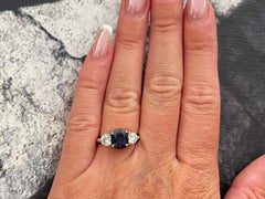 GIA Ring aus 14 Karat Gelbgold mit blauem Saphir und Diamant