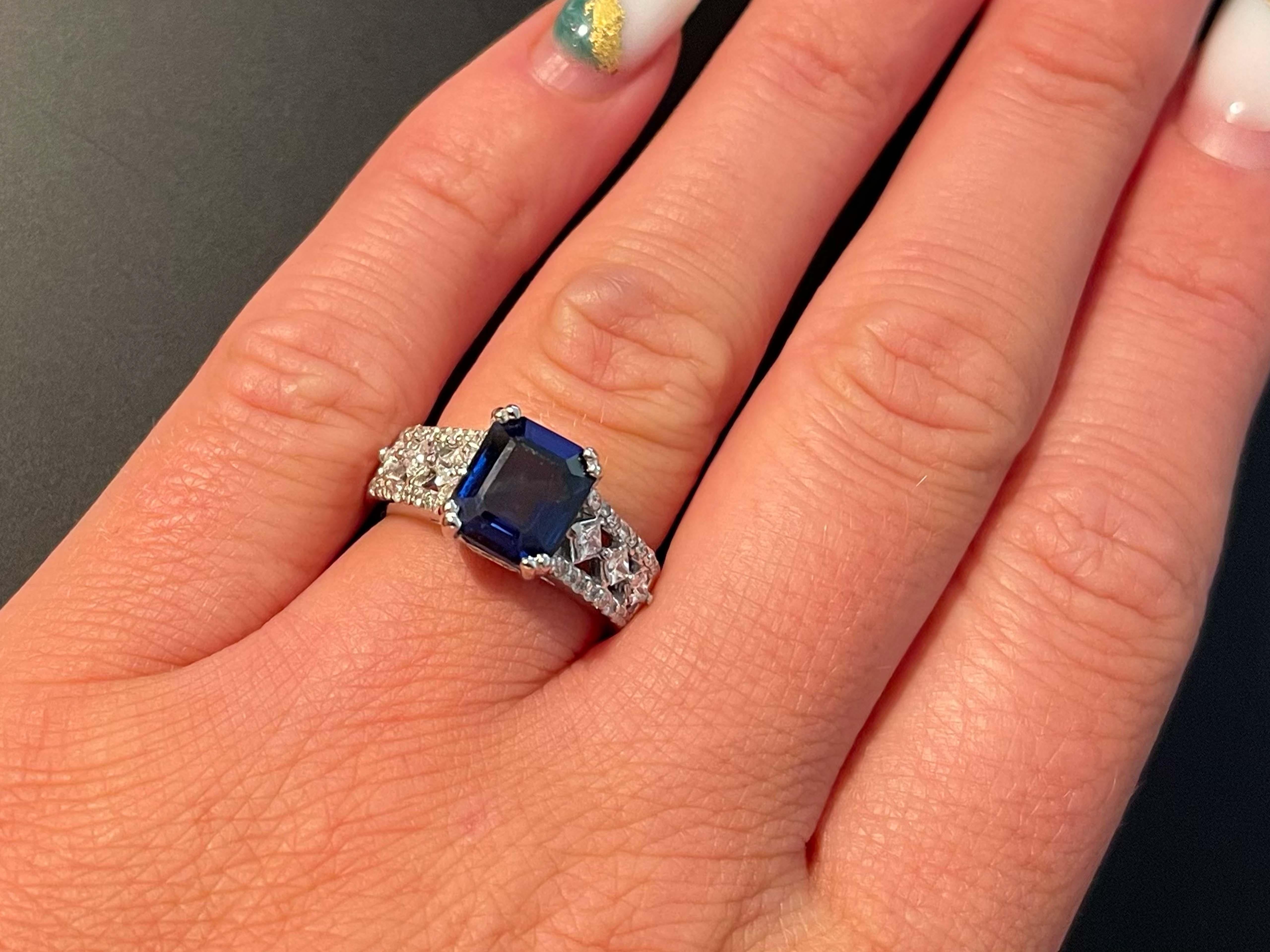 GIA Blue Sapphire Diamond Ring in 14k White Gold. This majestic 3 carat, octagonal, emerald cut, transparent, natural corundum sapphire gemstone is a real show stopper. Featuring a rich dark blue color that resembles the deep blue waters of the