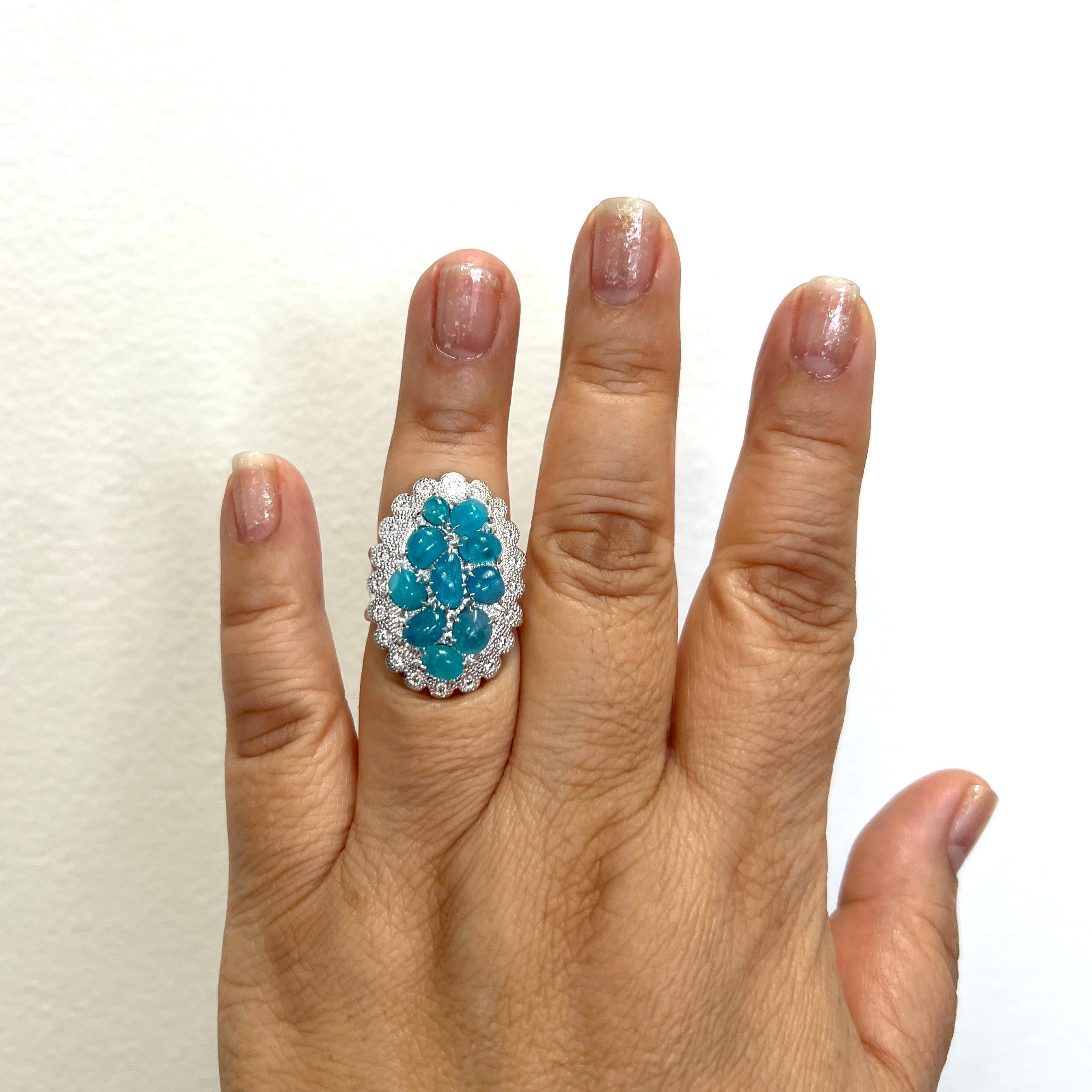 Beautiful 7.53 ct. Brazilian paraiba cabochons and 0.41 ct, white diamond rounds.  Handmade in 18k white gold.  Ring size 6.5.  GIA certificate included.