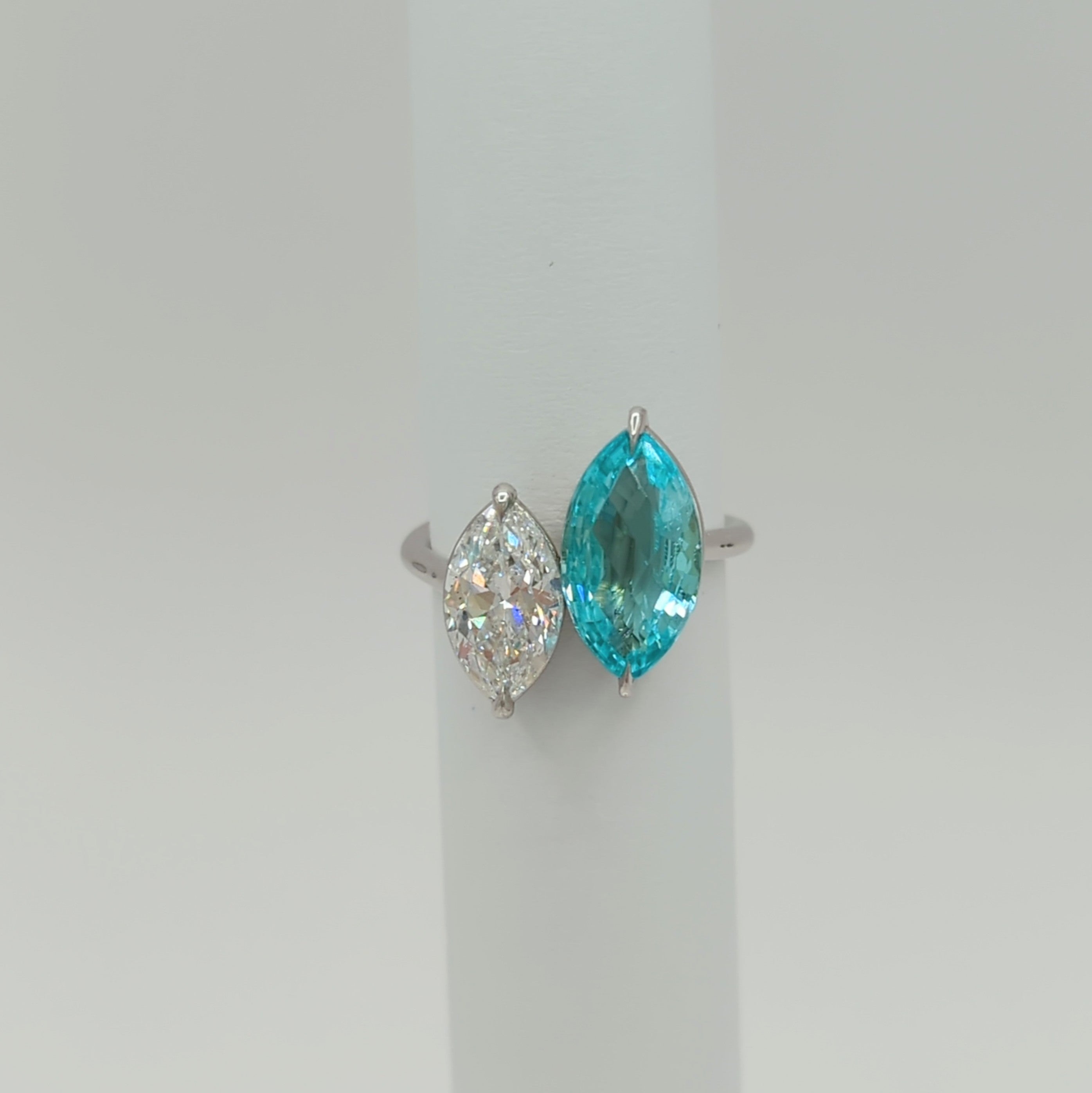 Stunning 3.00 ct. paraiba tourmaline marquise with a 1.52 ct. D SI2 white diamond marquise.  This Toi et Moi ring is so unique and fun.  Handmade in platinum.  Ring size 6.5.  GIA certificates included.