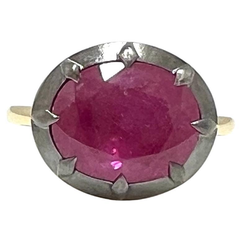 GIA Anillo de zafiro ovalado rosa púrpura de Birmania en oro amarillo de 18 quilates y rodio negro en venta
